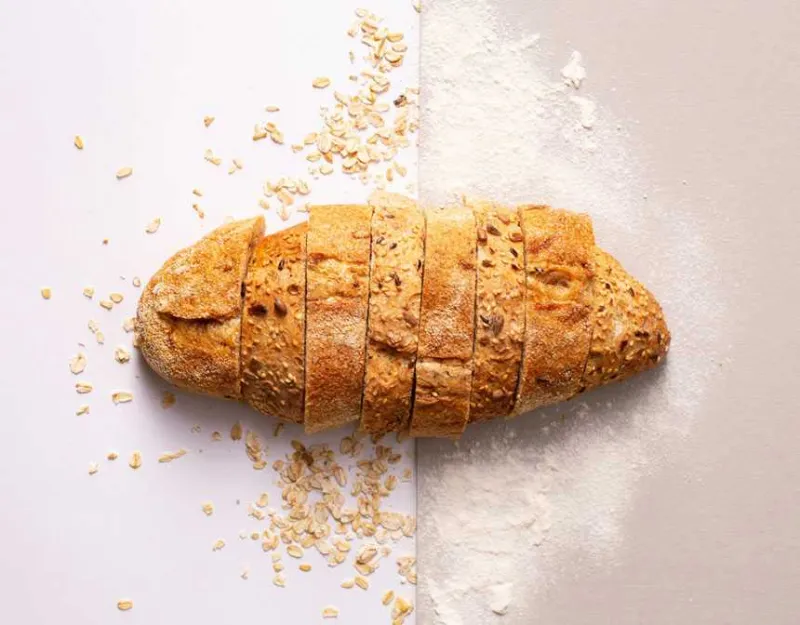 Sliced bread on white surface
