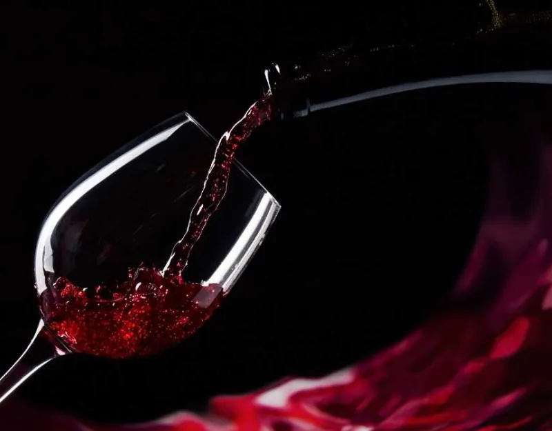 Red wine pouring