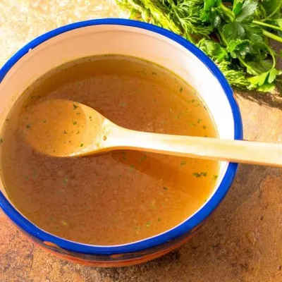 beef broth in a bowl