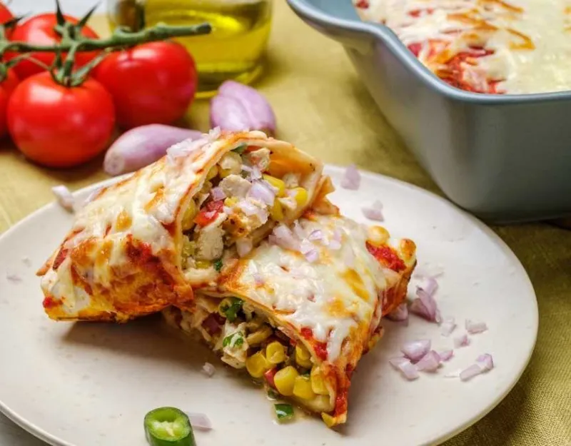 chicken enchiladas and tomatoes on the vine