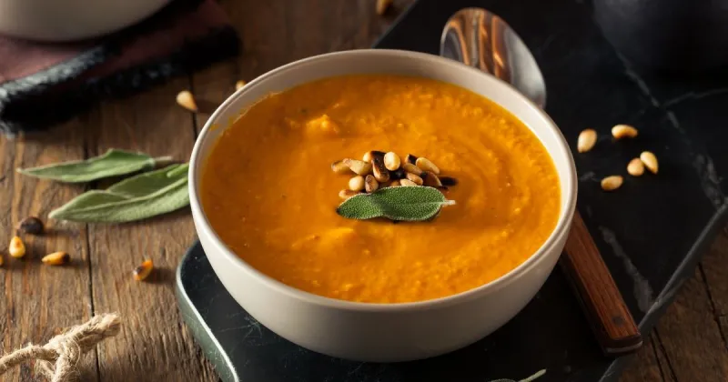A bowl of carrot soup