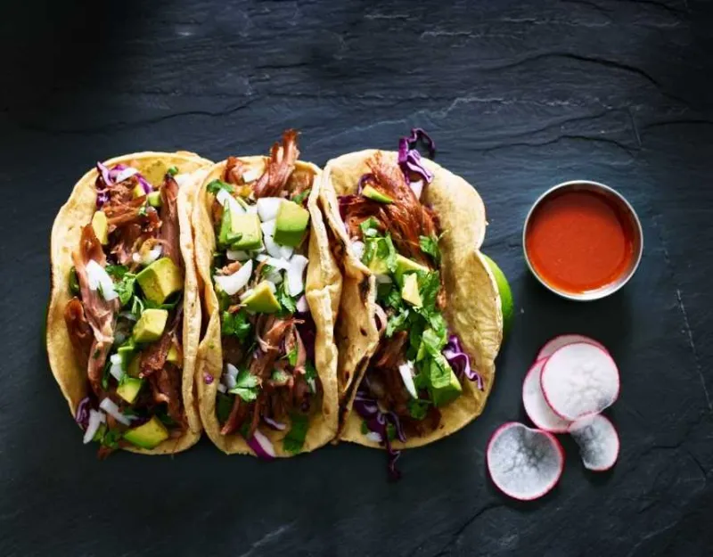 beef tacos with hot sauce