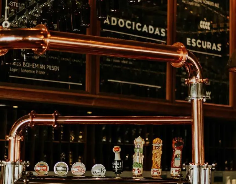 Brass colored pipes at a bar