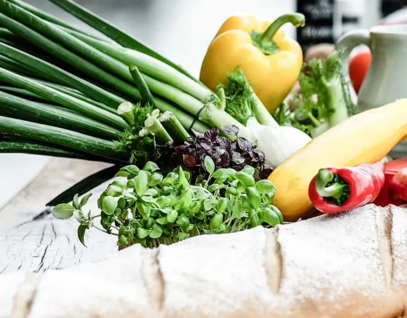 Assorted vegetables on brown wooden table