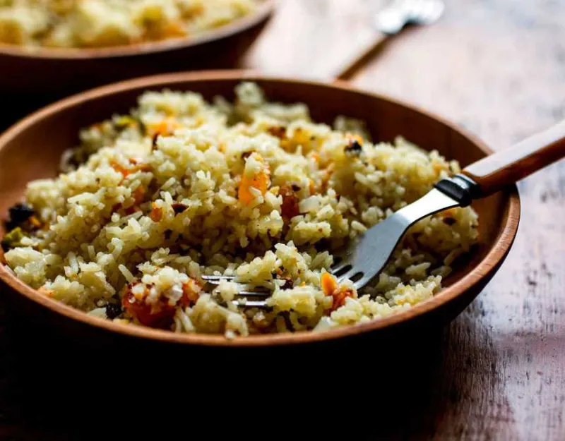 Rice pilaf with pistachios and almonds in a bowl