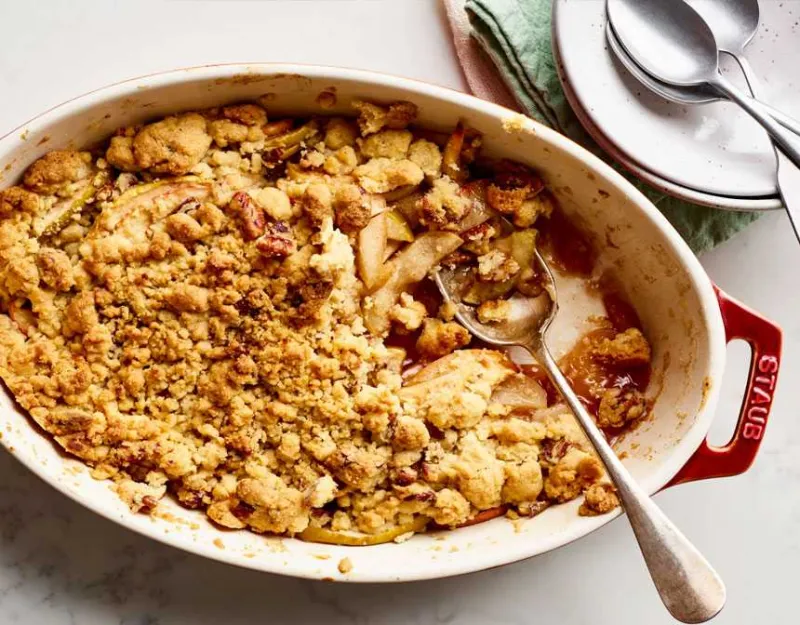 Apple crumble in red Staub bowl
