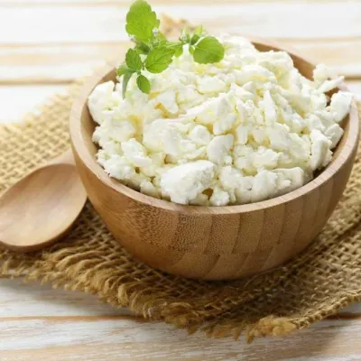 cottage cheese in a wooden bowl