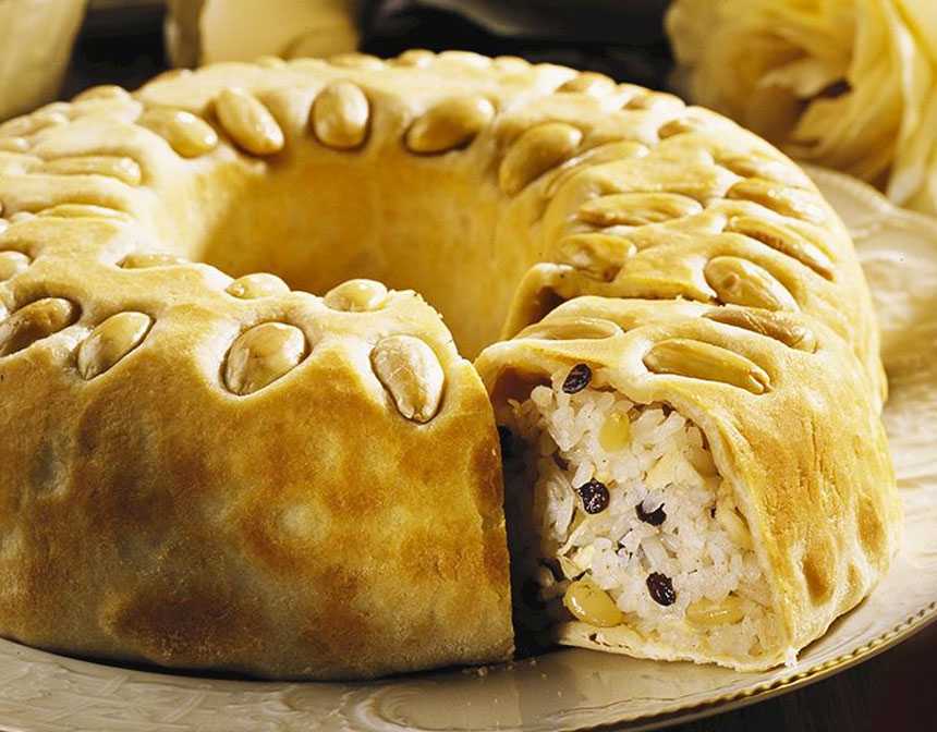 Rice with Dried Fruit and Almonds Wrapped in Dough